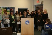 A group of teachers speak to the Board of Education Tuesday night about alternatives to proposed budget cuts.