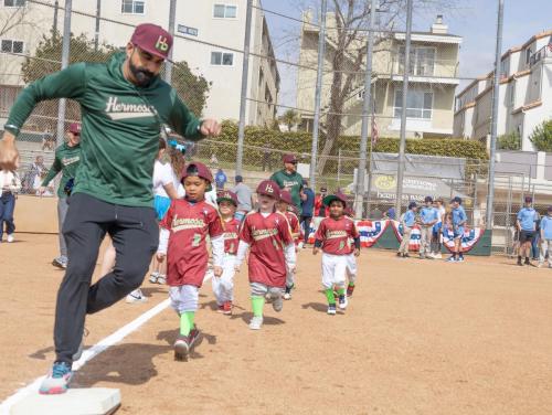 Coaches and players ran the bases.